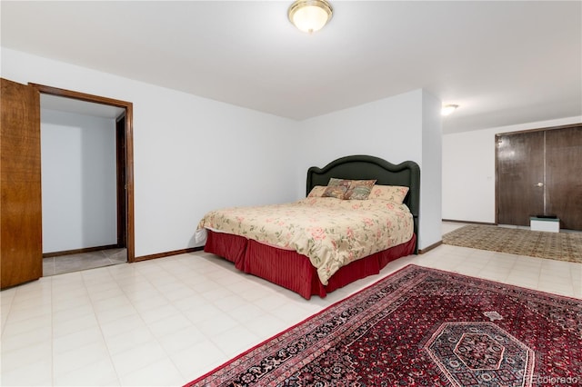 bedroom with tile patterned flooring