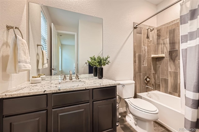 6063 Eldora St, Golden, CO 80403 - bathroom with vanity, shower / tub combo with curtain, and a textured wall