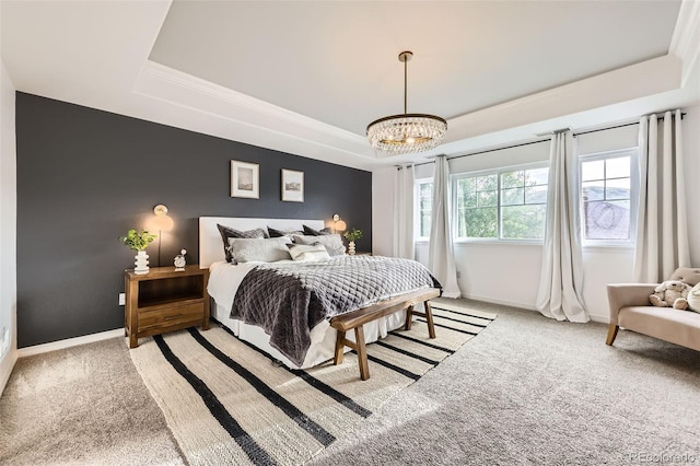 6063 Eldora St, Golden, CO 80403 - bedroom featuring a tray ceiling, light colored carpet, a chandelier, and crown molding