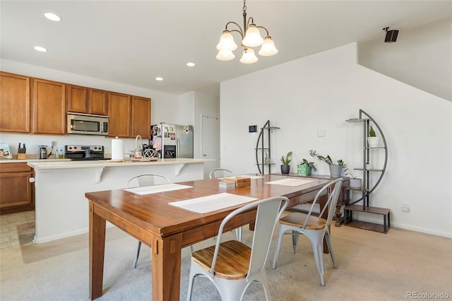 dining room featuring a chandelier, recessed lighting, light carpet, and baseboards