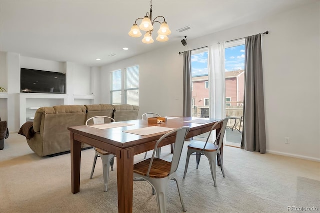 dining space featuring baseboards, visible vents, light colored carpet, a chandelier, and recessed lighting