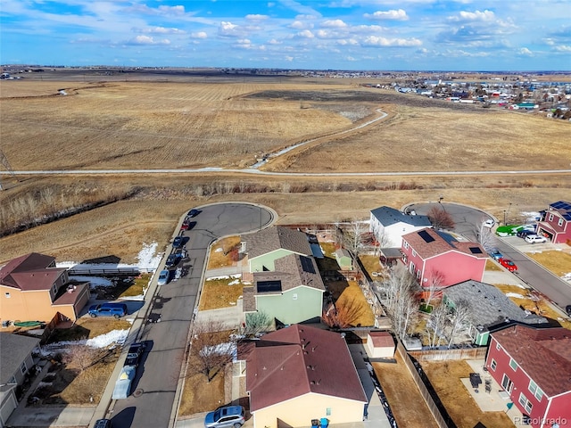 birds eye view of property with a residential view