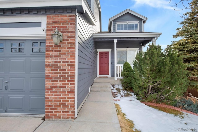 property entrance with a garage