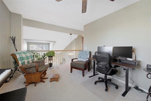 carpeted home office featuring ceiling fan with notable chandelier