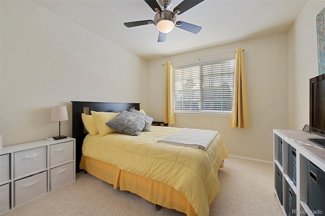 bedroom with light carpet and ceiling fan