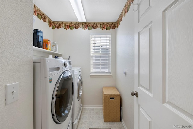 washroom featuring washer and dryer