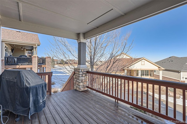 wooden deck with grilling area