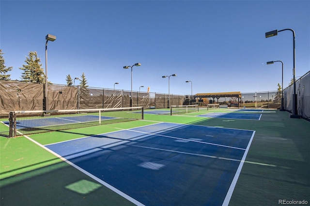 view of tennis court with basketball court