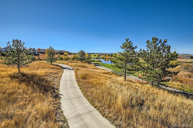 view of property's community featuring a water view