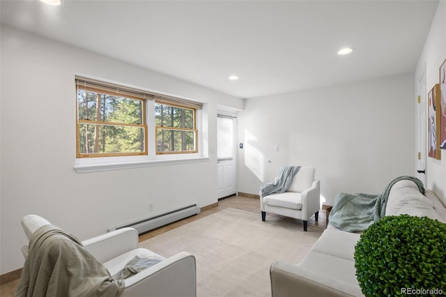 4185 Red Rock Dr, Larkspur, CO 80118 - living room featuring a baseboard heating unit and recessed lighting