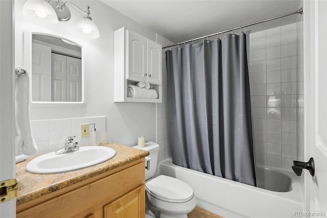 4185 Red Rock Dr, Larkspur, CO 80118 - bathroom featuring shower / bath combo, toilet, vanity, and tasteful backsplash