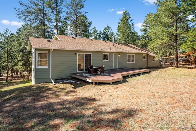 4185 Red Rock Dr, Larkspur, CO 80118 - rear view of property with a wooden deck and roof with shingles