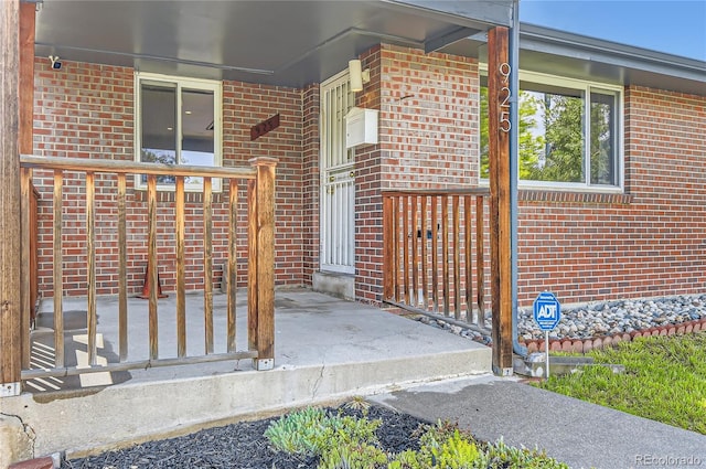 925 Wolff St, Denver, CO 80204 - doorway to property with brick siding