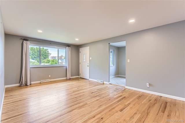 925 Wolff St, Denver, CO 80204 - spare room featuring light wood-type flooring and recessed lighting