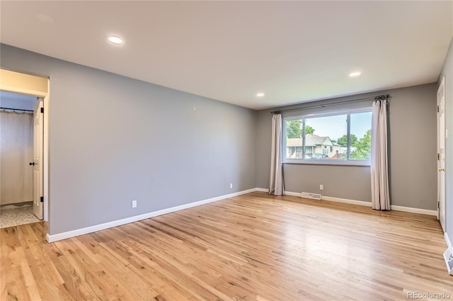 925 Wolff St, Denver, CO 80204 - unfurnished bedroom with light wood-type flooring and recessed lighting