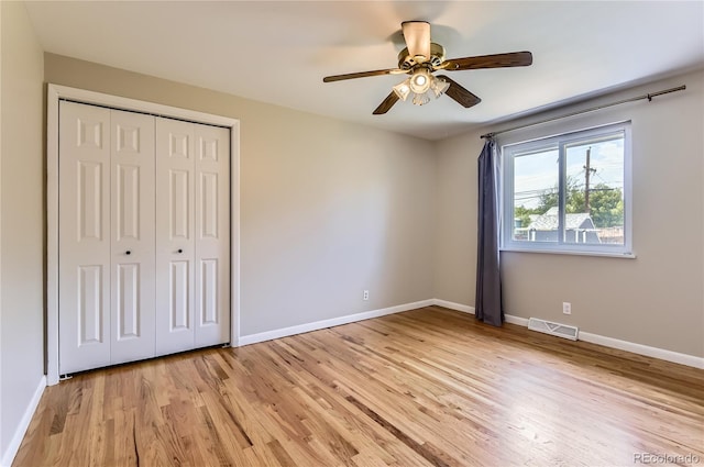 925 Wolff St, Denver, CO 80204 - unfurnished bedroom featuring light wood-type flooring, a closet, and ceiling fan