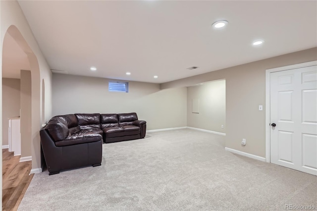 925 Wolff St, Denver, CO 80204 - carpeted living area featuring recessed lighting and arched walkways