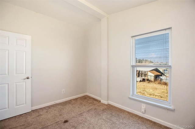 view of carpeted spare room