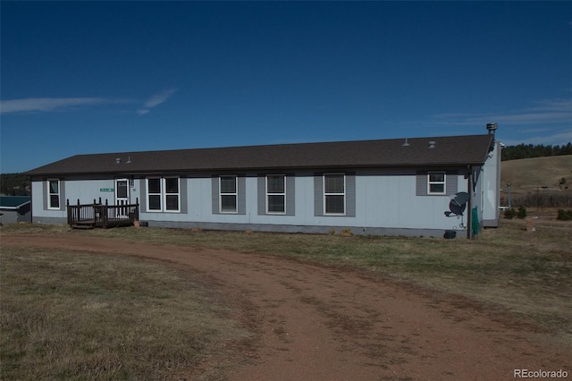 exterior space with a front yard