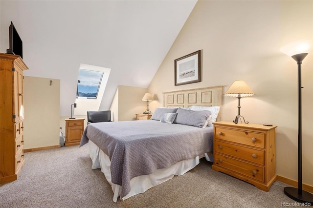 carpeted bedroom featuring high vaulted ceiling