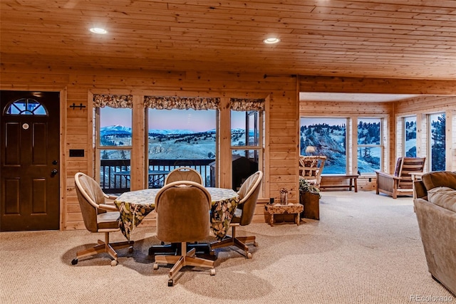 305 Travois Ct, Como, CO 80432 - dining room featuring carpet, wood ceiling, recessed lighting, wood walls, and healthy amount of natural light