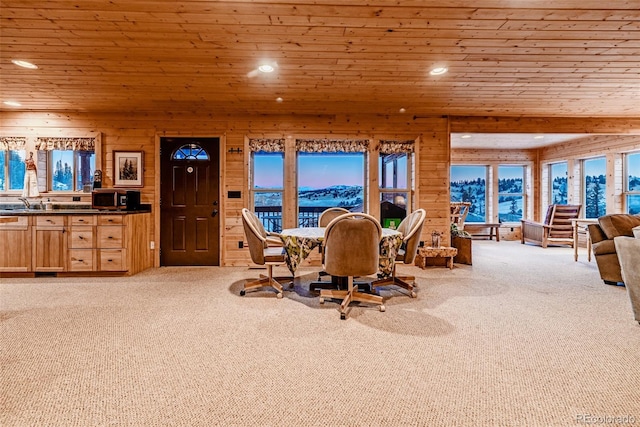 305 Travois Ct, Como, CO 80432 - carpeted dining space featuring recessed lighting, wooden ceiling, and wood walls