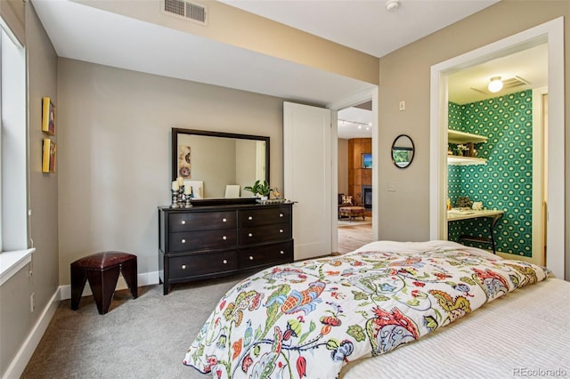 340 S Lafayette St Unit 204, Denver, CO 80209 - carpeted bedroom featuring baseboards