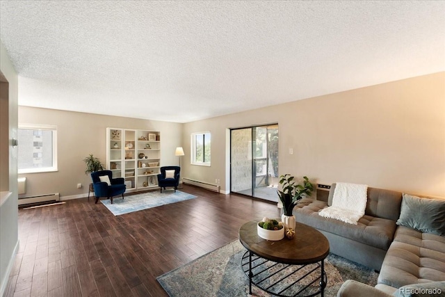 13902 E Marina Dr Unit 202, Aurora, CO 80014 - living area with a baseboard radiator, a textured ceiling, dark wood-type flooring, and built in features