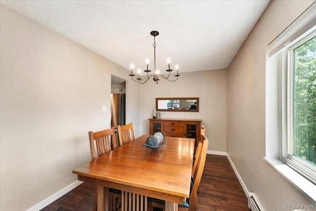 13902 E Marina Dr Unit 202, Aurora, CO 80014 - dining room featuring a chandelier, dark wood finished floors, and a baseboard heating unit