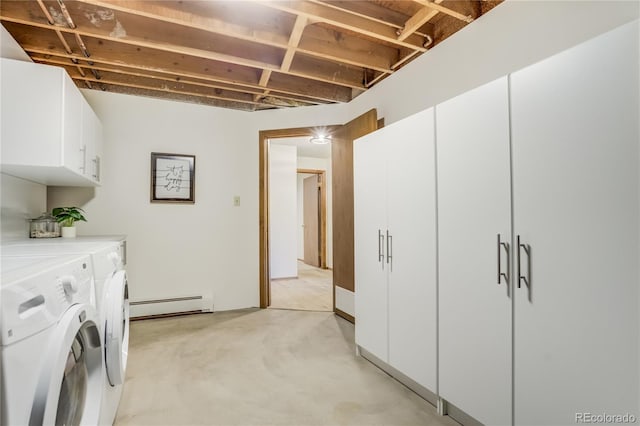 9610 Mohawk Trl, Cascade, CO 80809 - washroom featuring baseboard heating, washing machine and dryer, and cabinet space