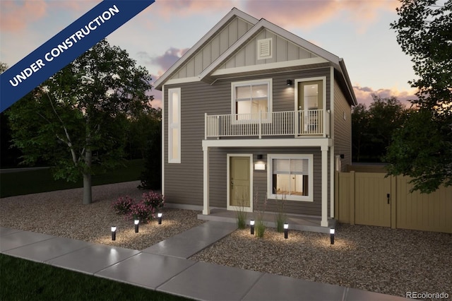 46546 Avery Ln, Bennett, CO 80102 - view of front of house featuring board and batten siding and a balcony