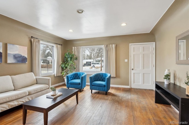 living room with light hardwood / wood-style floors