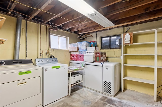 laundry room featuring washer and clothes dryer