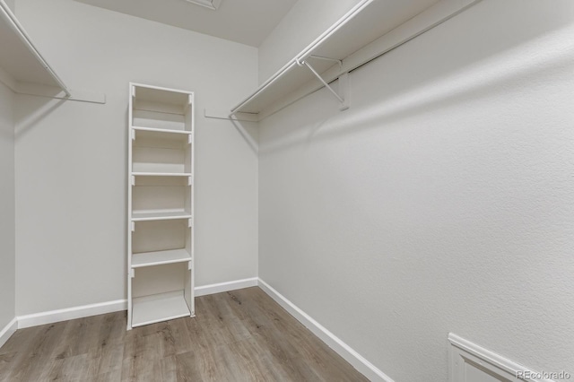 8346 S Upham Way, Littleton, CO 80128 - spacious closet with wood finished floors