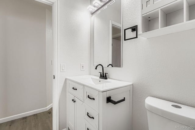 8346 S Upham Way, Littleton, CO 80128 - bathroom with vanity and wood finished floors