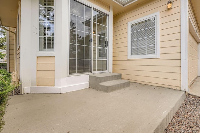 8346 S Upham Way, Littleton, CO 80128 - view of patio with a garage