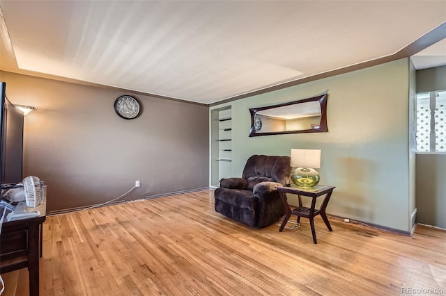 5673 Johnson St, Arvada, CO 80002 - living area with light wood-style flooring