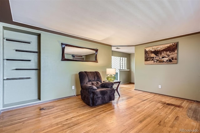 5673 Johnson St, Arvada, CO 80002 - living area featuring light wood-style flooring and baseboards