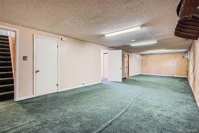 5673 Johnson St, Arvada, CO 80002 - below grade area with carpet floors, a textured ceiling, and stairway