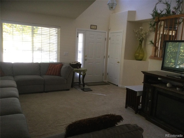 13674 Plaster Cir, Broomfield, CO 80023 - carpeted living area featuring vaulted ceiling