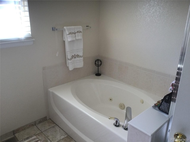 13674 Plaster Cir, Broomfield, CO 80023 - full bathroom with a jetted tub and tile patterned floors