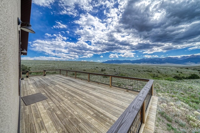 1610 Timber Ridge Rd, Westcliffe, CO 81252 - wooden terrace with a rural view and a mountain view