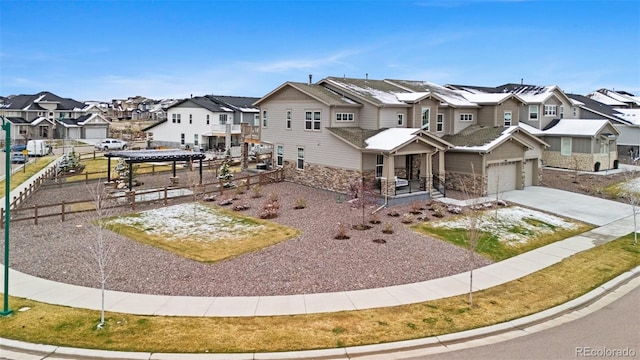 6614 S Vandriver Way, Aurora, CO 80016 - view of front of house featuring a residential view, stone siding, and concrete driveway