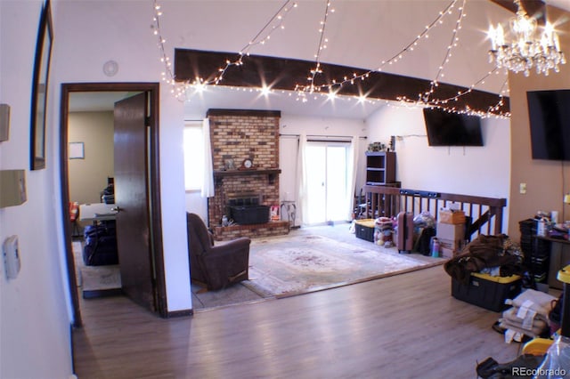 living room featuring a fireplace and wood finished floors