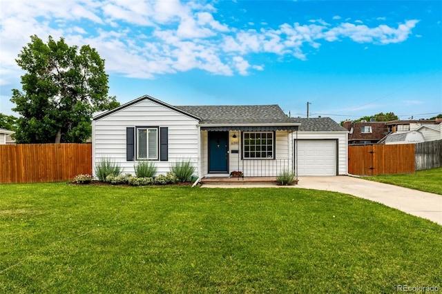 6390 W 45th Ave, Wheat Ridge, CO 80033 - single story home with driveway, an attached garage, and roof with shingles