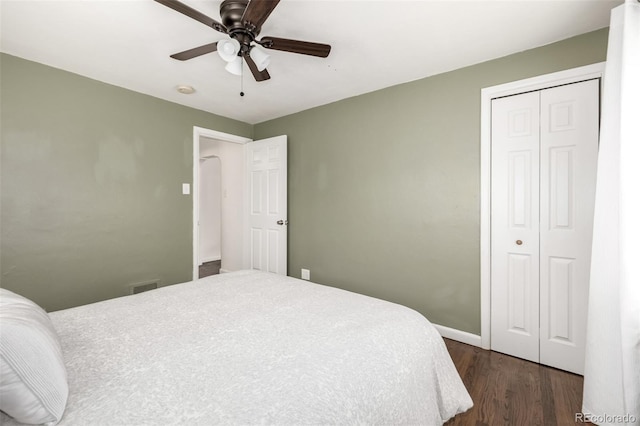 6390 W 45th Ave, Wheat Ridge, CO 80033 - bedroom with dark wood finished floors, a closet, and a ceiling fan