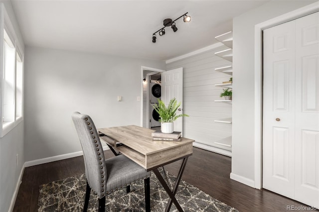 6390 W 45th Ave, Wheat Ridge, CO 80033 - office with estacked washer and dryer, dark wood-style flooring, and wood walls