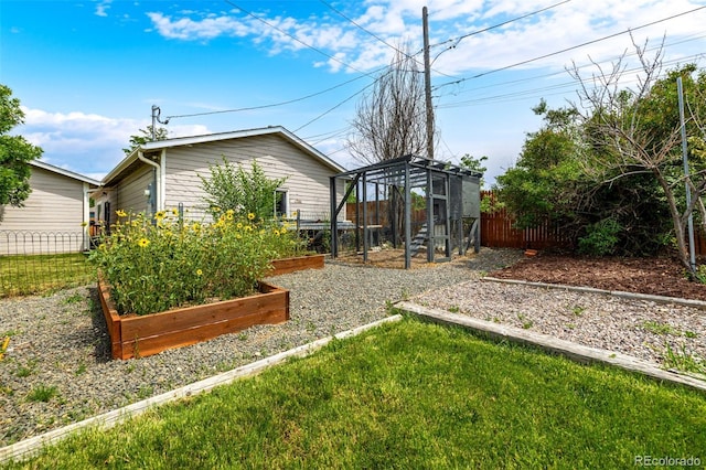 6390 W 45th Ave, Wheat Ridge, CO 80033 - view of yard with a vegetable garden