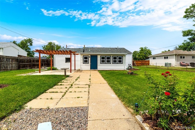 6390 W 45th Ave, Wheat Ridge, CO 80033 - back of house featuring a pergola, a patio, and a fenced backyard