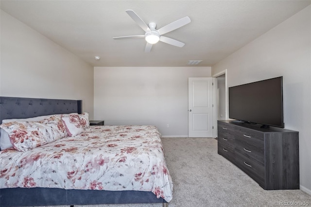 bedroom featuring a ceiling fan, carpet floors, baseboards, and visible vents